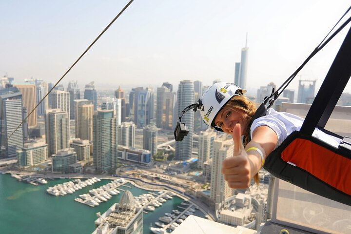 Experience breathtaking views of Dubai Marina as you soar high above stunning skyscrapers and serene canals on the world's longest urban zipline XLine Dubai Marina.